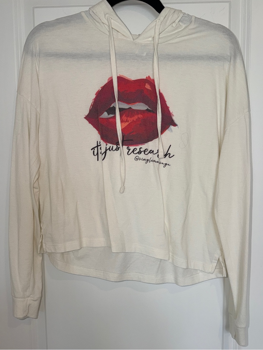 Single Mom Saga Biting Lip “It’s Just Research” Graphic Cream Hoodie Top